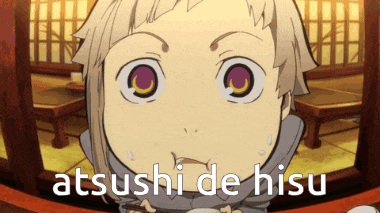 a close up of a child 's face with the words atushi de hisu written below it