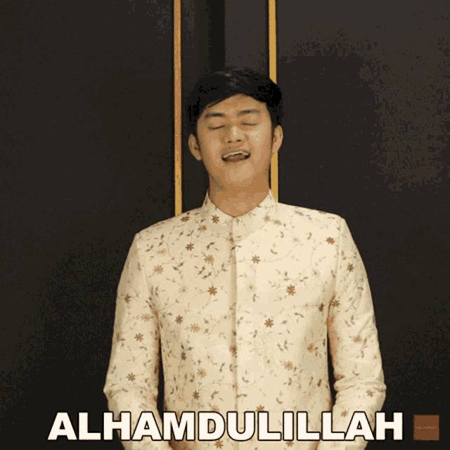 a man with his hands on his chest and the word alhamdulillah on the bottom