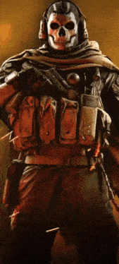 a soldier with a skull mask on his face is holding a gun and a walkie talkie .