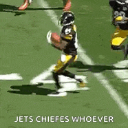 a football player is being tackled by another player on a field and says `` jets chiefs whoever '' .