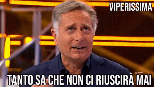 a man in a suit says tanto sa che non ci riuscire mai