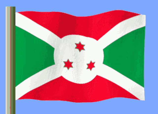a red green and white flag with three stars on it