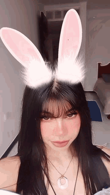 a girl with bunny ears on her head