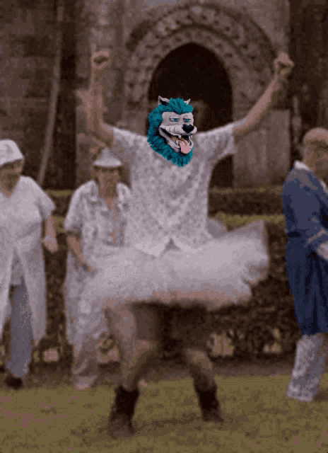a man in a white shirt with a blue wolf mask on his face
