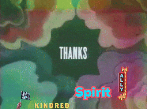 a sign that says thanks kindred spirit with a person holding a flag