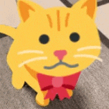 a yellow cat with a red bow on its neck is walking on the floor .