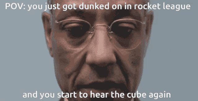 a close up of a man 's face with the caption " you just got dunked on in rocket league " on top