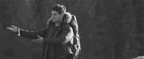 a black and white photo of a man with a backpack and the words like i below him