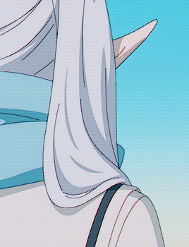 a girl with white hair and blue eyes has a scarf around her neck