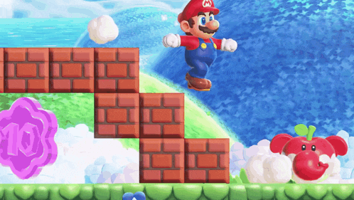 mario is jumping over a brick block in a game