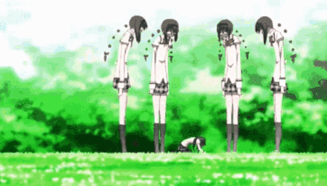 a group of anime characters are bowing down in a field .
