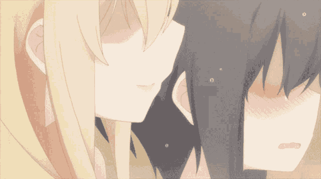 a couple of anime girls standing next to each other looking at each other