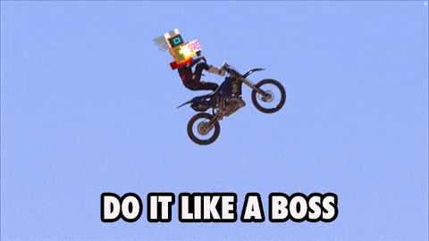 a man riding a dirt bike in the air with the words do it like a boss below him