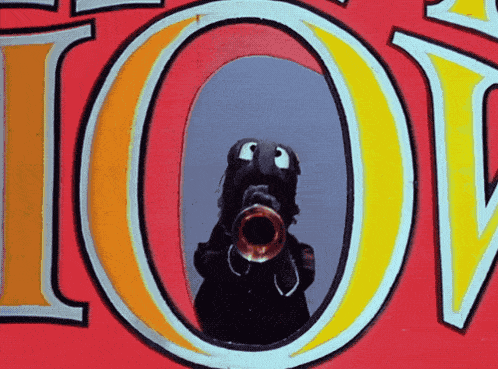 a cartoon character playing a trumpet in front of the word joy