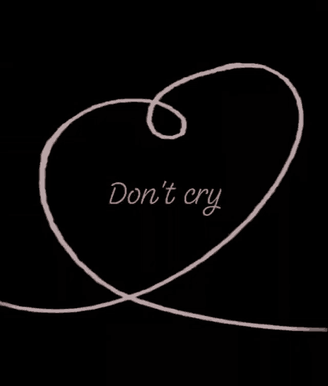 a drawing of a spiral with the words " do n't cry " written in pink