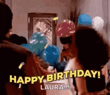 a woman is holding a bunch of balloons and saying `` happy birthday ! ''