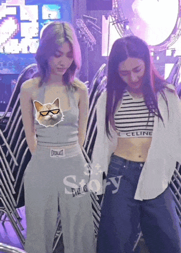 two women standing next to each other with one wearing a celine crop top
