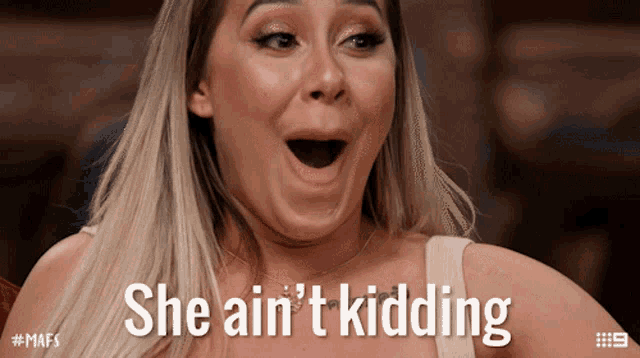 a woman with her mouth open and the words she ain 't kidding above her