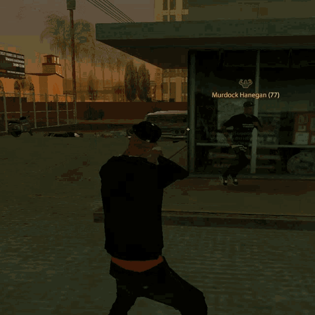 a man in a video game is standing in front of a building with murdock hanegan ( 77 ) written on it