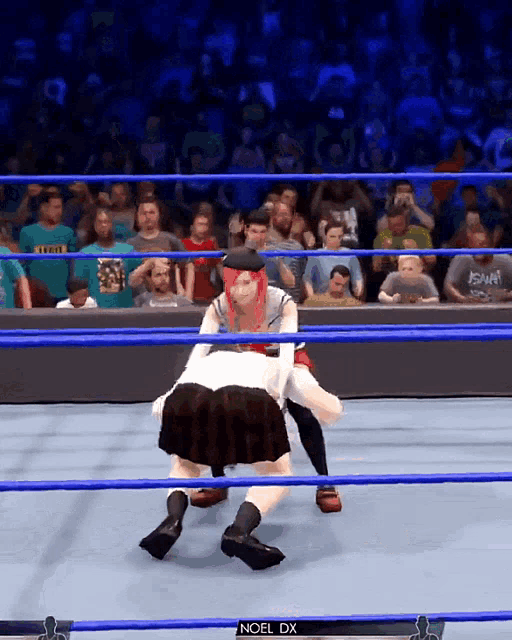 a video game screen shows a woman wrestling another woman with the words noel dx on the bottom