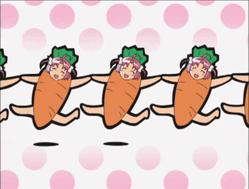 a group of girls dressed as carrots are dancing together