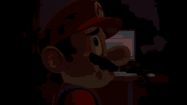 a red cartoon character with big eyes and the word to on it