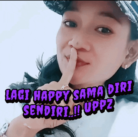 a woman holds her finger to her lips with the words lagi happy sama diri sendiri written below her