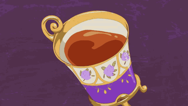 a purple cup with roses on it is filled with brown liquid