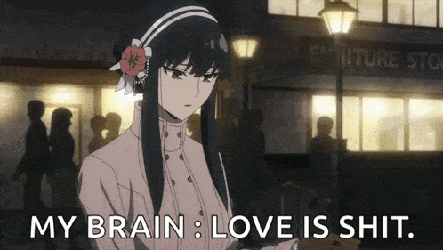 a woman is standing in front of a building with the words `` my brain love is shit '' written on her face .