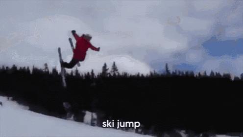 a person is jumping in the air with the word ski jump below them