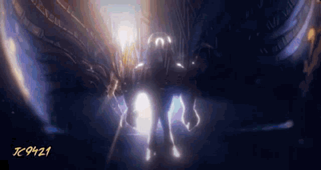 a person is standing in a dark room with a glowing light coming out of their chest .