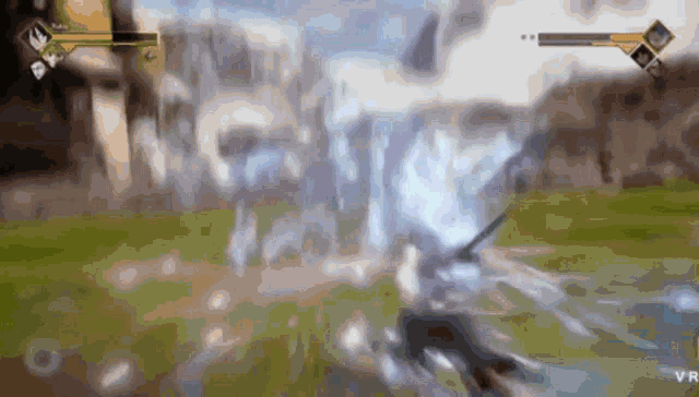 a person is playing a video game with a sword in their hand and a waterfall in the background .