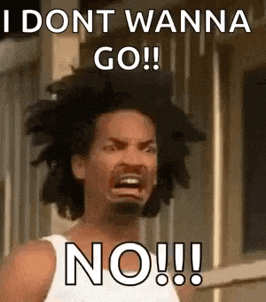 a man with curly hair is making a funny face and saying `` i dont wanna go ! ''