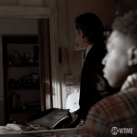 a showtime advertisement shows a man talking to another man
