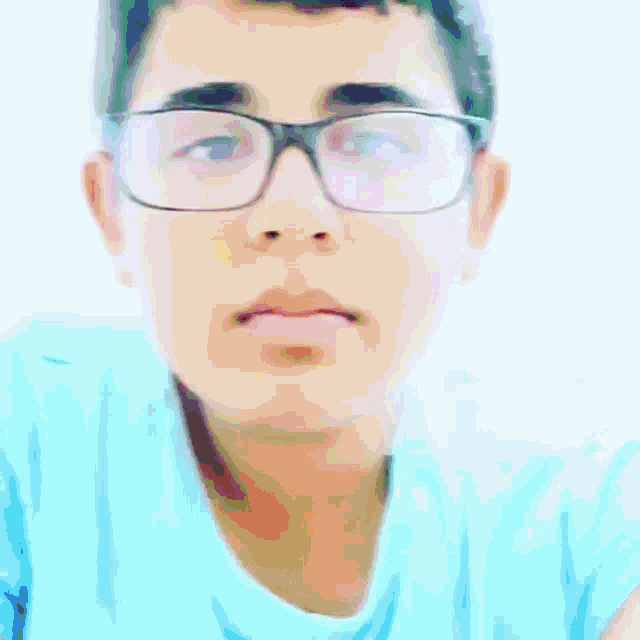 a close up of a person wearing glasses with a blue frame