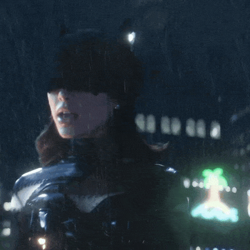 a woman in a catwoman costume stands in the rain