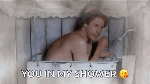 a shirtless man is taking a shower with the words you in my shower above him .