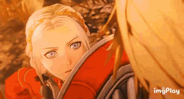 a woman in a red dress is looking at a man in a red armor .