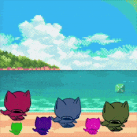 a group of cats sitting on the beach looking at the ocean