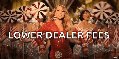 a woman in a red dress is standing in front of a group of cheerleaders with the words lower dealer fees written below her