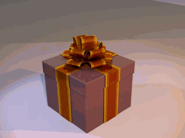 a purple gift box with a gold bow