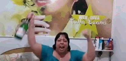 a woman is singing in front of a sign that says web diva