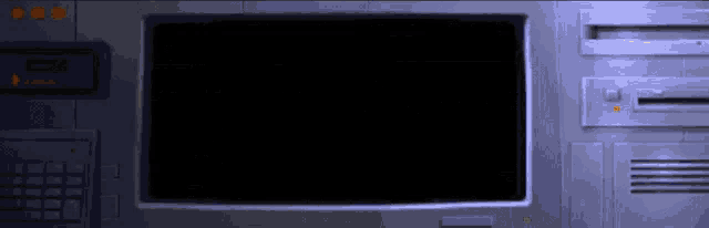 a computer monitor with a black screen and the word pause on it