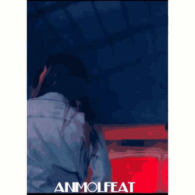 a poster for an album called anmolfeat shows a woman in a white shirt