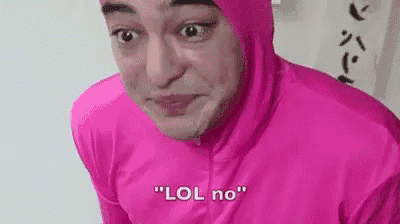 a man in a pink suit is making a funny face and says lol no .