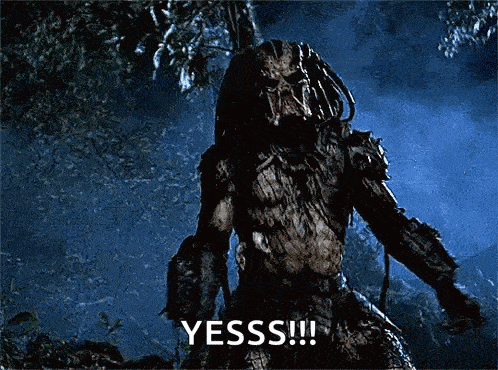 a predator is standing in the woods and says yesss