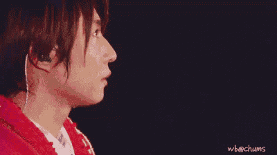 a close up of a person 's face with the words wb @ chums written below it