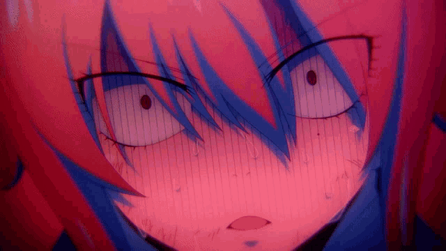 a close up of a girl 's face with red hair and blue eyes