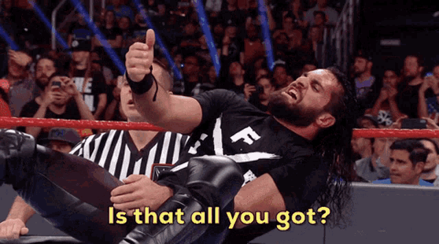a wrestler giving a thumbs up with the words " is that all you got " below him