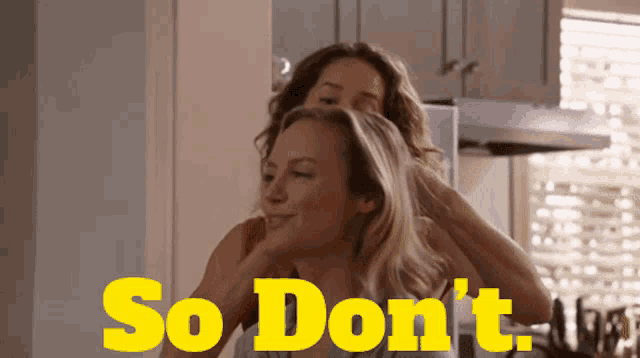 two women in a kitchen with the words so don 't in yellow letters